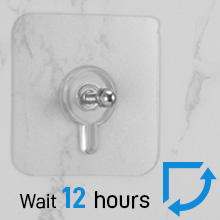 chiodi adesivi per quadri muro